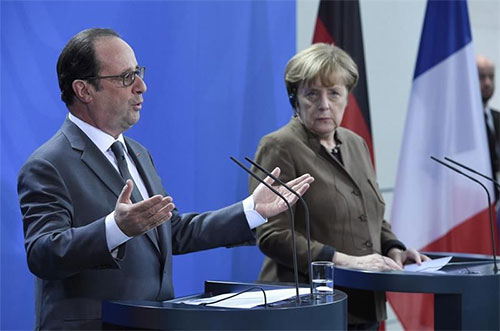 La canciller alemana, Angela Merkel, y el presidente francés, François Hollande La derrota de los terroristas en Alepo “preocupa” a Francia y Alemania